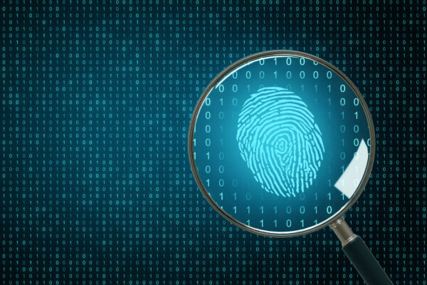 Fingerprint under a magnifying glass representing digital forensics and cybersecurity with data bits in the background