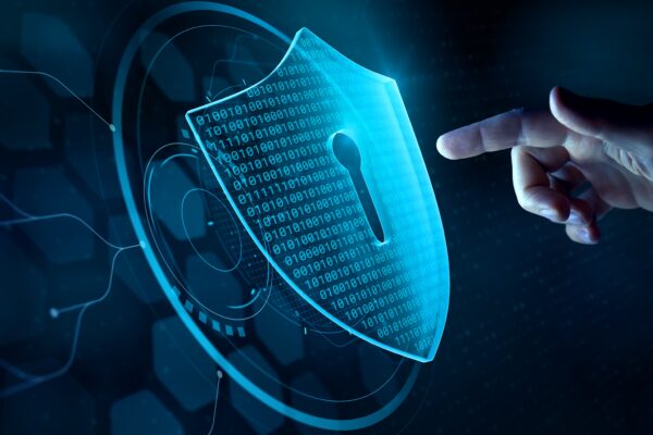 Cyber security and data protection on internet. Person touching virtual shield, secure access, encrypted connection