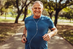 Bupa - Healthy male jogger running in a park