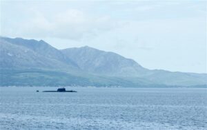 Submarine Delivery Agency - Submarine appearing out of lake