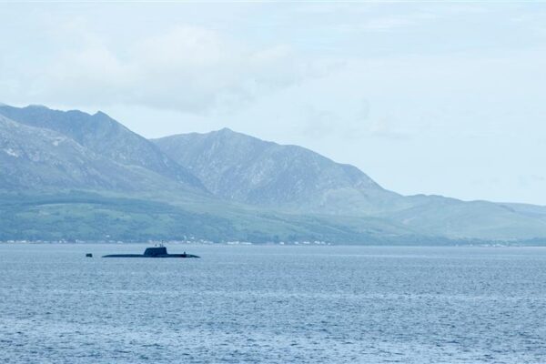 Submarine Delivery Agency - Submarine appearing out of lake
