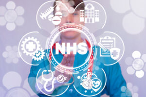 Black Country Healthcare Trust - NHS healthcare worker interacting with virtual medical touchscreen in front of her