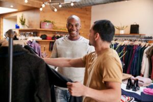 River Island - Shop employee helping a customer in a clothing shop