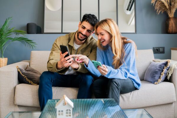 Principality Building Society - Couple looking at their financial accounts online