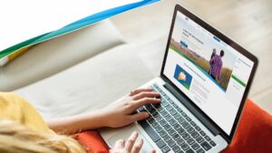 Woman viewing newly designed Cabot Financial website