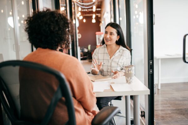 Woman interviewing candidate for a job role