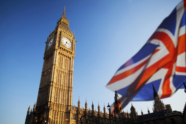 UK flag with Big Ben and House of Parliament in the background