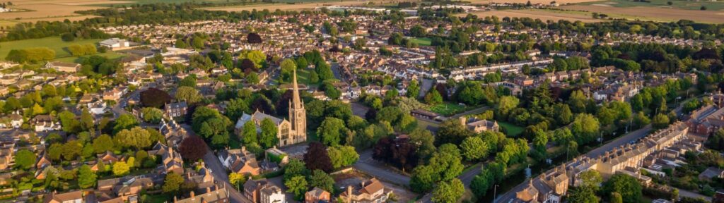 Aerial view of uk town with church